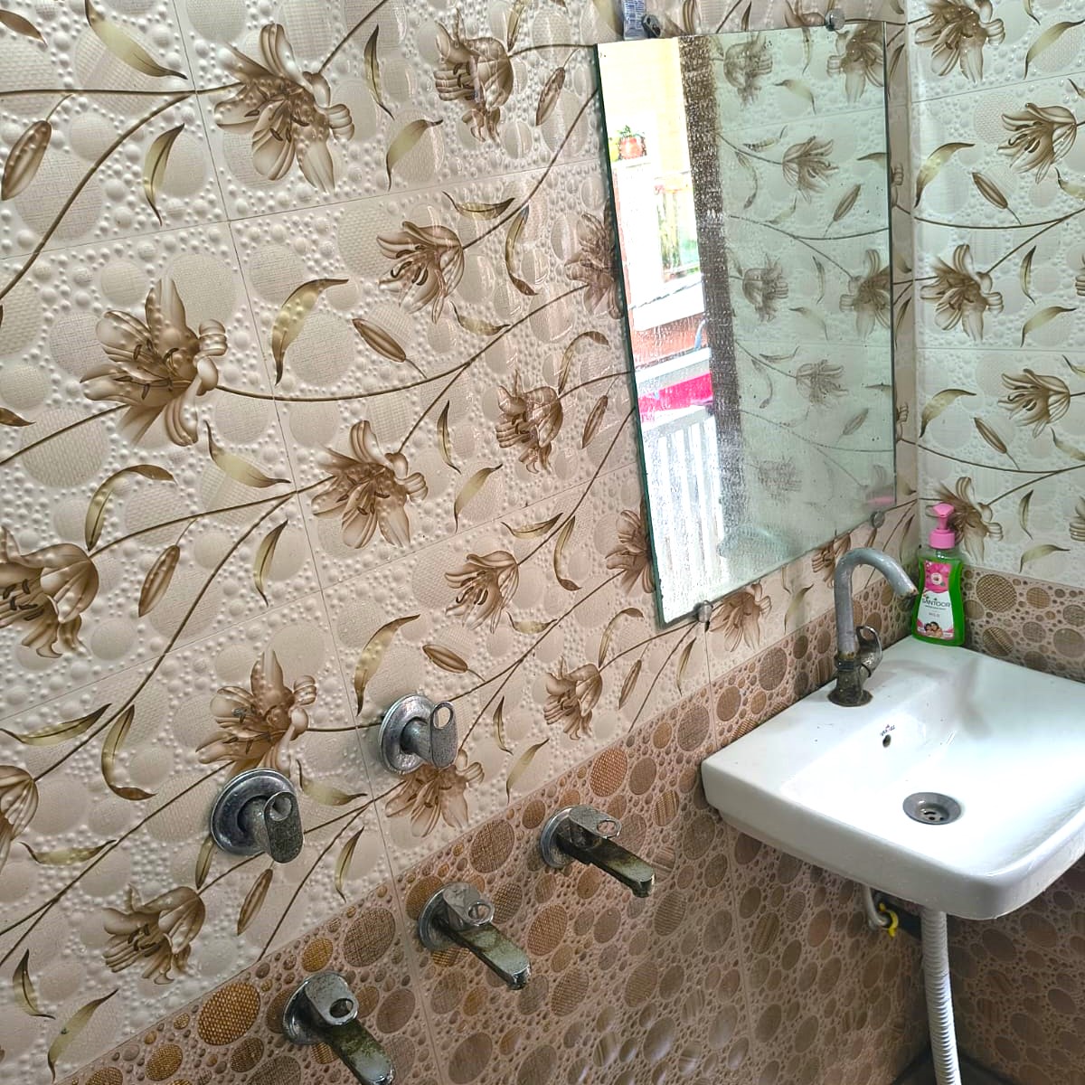 Outdoor seating area with garden view for residents to relax and socialize in fresh air